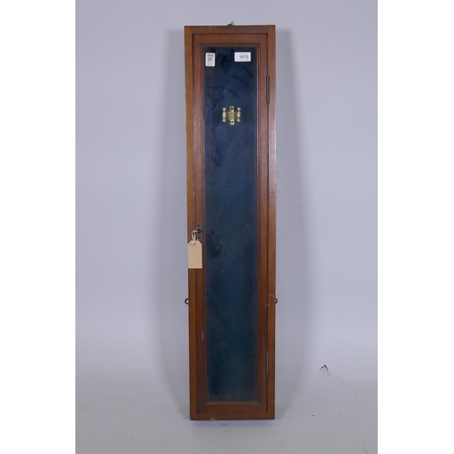 1075 - Antique mahogany single door hanging display case, fitted to hold a cricket bat, 22 x 11 x 99cm