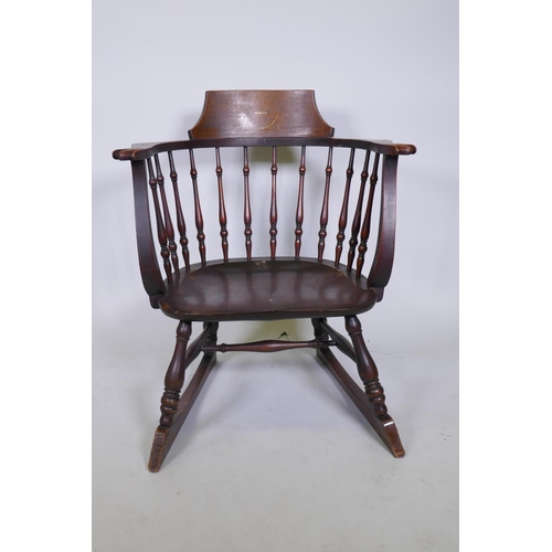 1079 - A Victorian stained and inlaid beechwood bow armchair with saddle seat, raised on turned supports wi... 