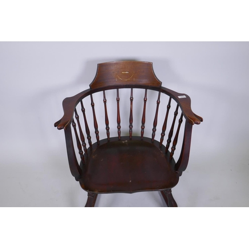 1079 - A Victorian stained and inlaid beechwood bow armchair with saddle seat, raised on turned supports wi... 