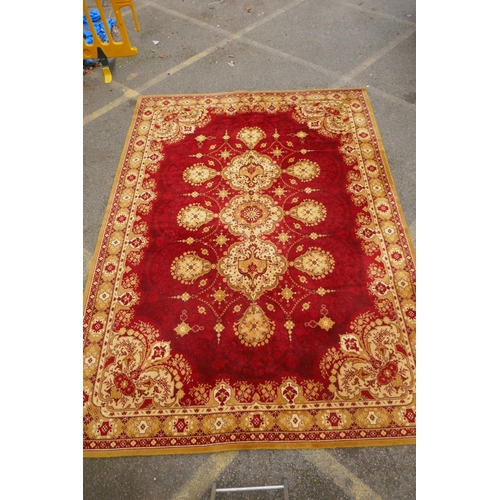 1084 - A Belgian carpet with oriental design, 325 x 245cm