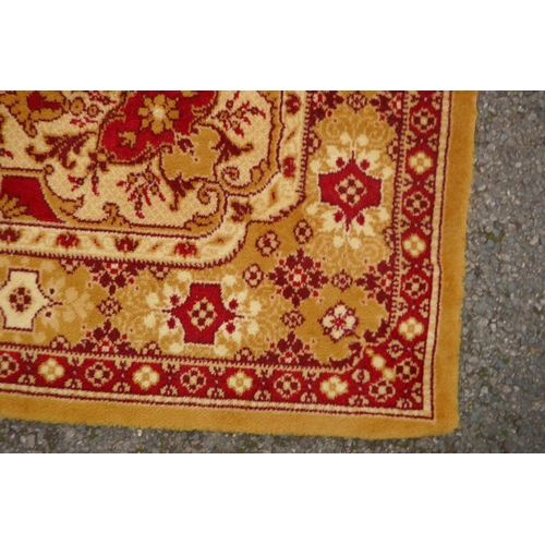 1084 - A Belgian carpet with oriental design, 325 x 245cm