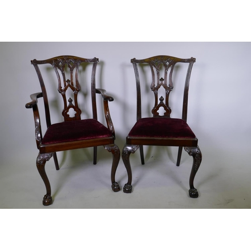 1091 - A set of ten (two plus eight) Chippendale style dining chairs with carved and pierced splats and dro... 