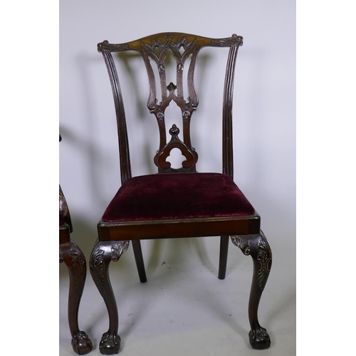 1091 - A set of ten (two plus eight) Chippendale style dining chairs with carved and pierced splats and dro... 