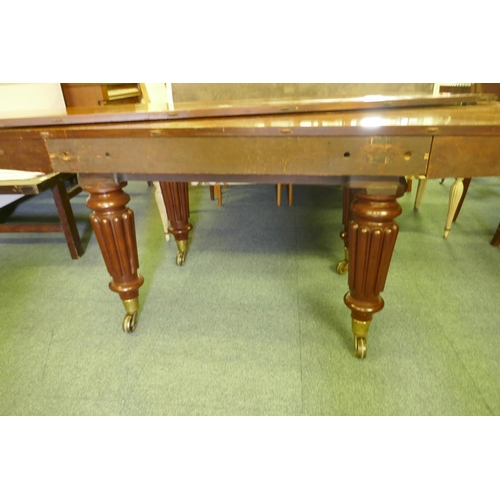 1092 - A C19th mahogany dining table in the manner of Gillows, two ends with Imperial Action type extending... 