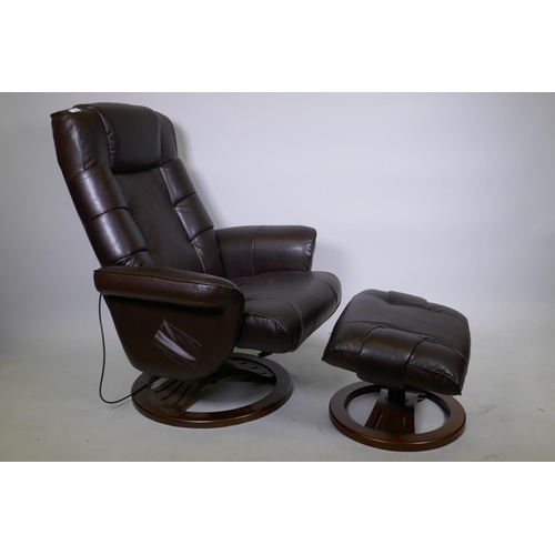 1095 - A leather swivel and reclining easy chair with massage action and matching footstool