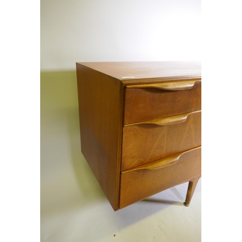 1098 - A mid century McIntosh & Co teak sideboard with three doors and a flight of three graduated draw... 