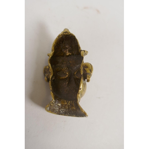 115 - A C19th Indian miniature bronze mask