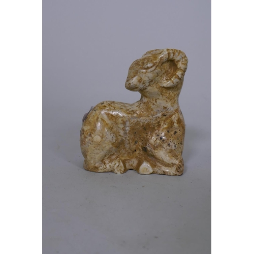 116 - A Middle Eastern hardstone carving of a ram, 8cm high