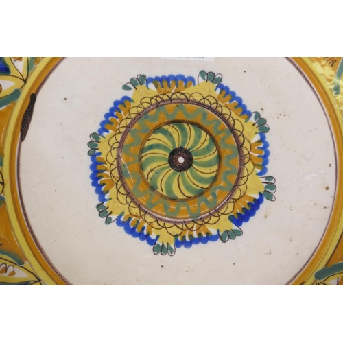 12 - Antique Continental faience/majolica glazed terracotta dish, 34cm diameter