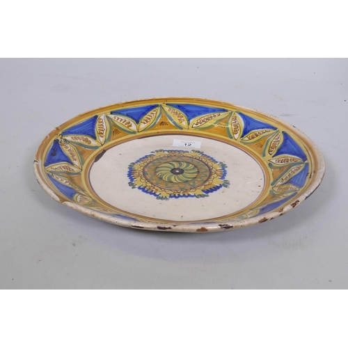 12 - Antique Continental faience/majolica glazed terracotta dish, 34cm diameter