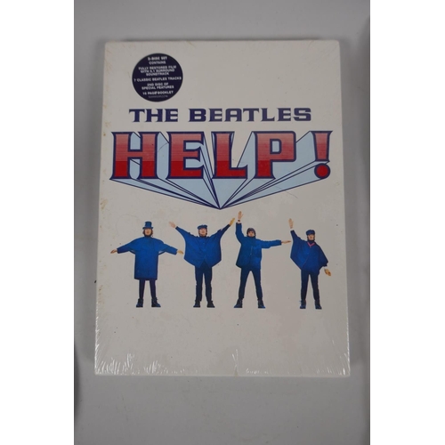 122 - Beatles memorabilia, a Grafton bone china dish, a Sgt Pepper's Lonely Hearts tea towel, a two disk D... 