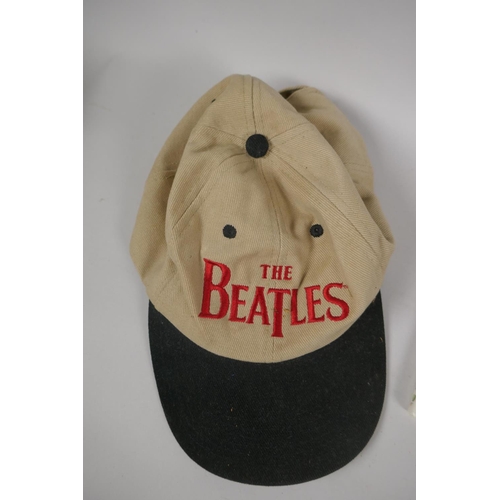 122 - Beatles memorabilia, a Grafton bone china dish, a Sgt Pepper's Lonely Hearts tea towel, a two disk D... 