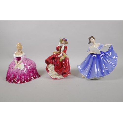 128 - Three Royal Doulton porcelain figurines, including Victoria HN2471, Top O' the Hill HN1834, and Elai... 