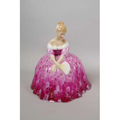 128 - Three Royal Doulton porcelain figurines, including Victoria HN2471, Top O' the Hill HN1834, and Elai... 