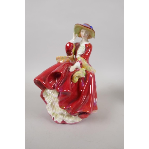 128 - Three Royal Doulton porcelain figurines, including Victoria HN2471, Top O' the Hill HN1834, and Elai... 