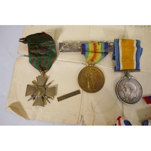 13 - A group of WWI military medals, the 1914-18 Medal and Great War for Civilisation awarded to 34176 Sg... 