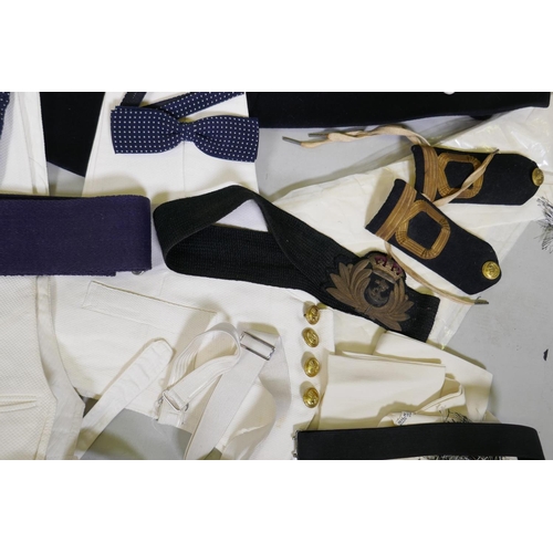 133 - A British Royal Navy Reserve Officer's uniform, cap, belt, mess uniform