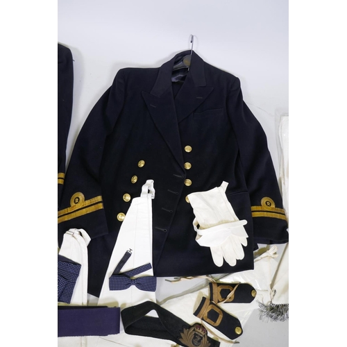 133 - A British Royal Navy Reserve Officer's uniform, cap, belt, mess uniform