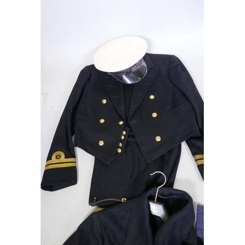 133 - A British Royal Navy Reserve Officer's uniform, cap, belt, mess uniform