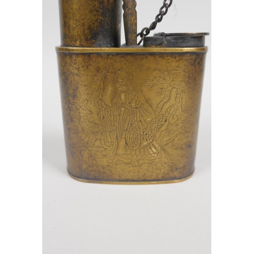 136 - A Chinese brass tobacco water pipe decorated with Shou Lao and character inscription, 29cm high