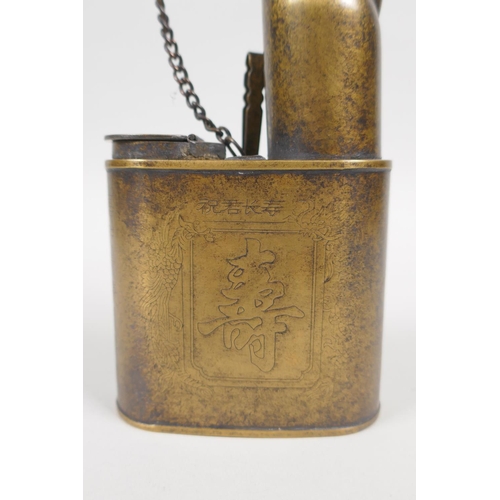 136 - A Chinese brass tobacco water pipe decorated with Shou Lao and character inscription, 29cm high