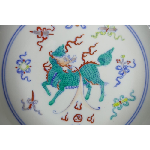 138 - A Chinese doucai porcelain dish with kylin and auspicious symbol decoration, Chenghua 6 character ma... 