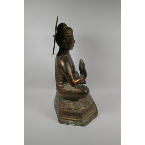 141 - A large Tibetan coppered bronze figure of Buddha, 48cm high