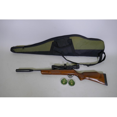 149 - BSA Lightning .22 calibre break barrel air rifle, No S-827859-10, fitted with silencer and BSA Essen... 