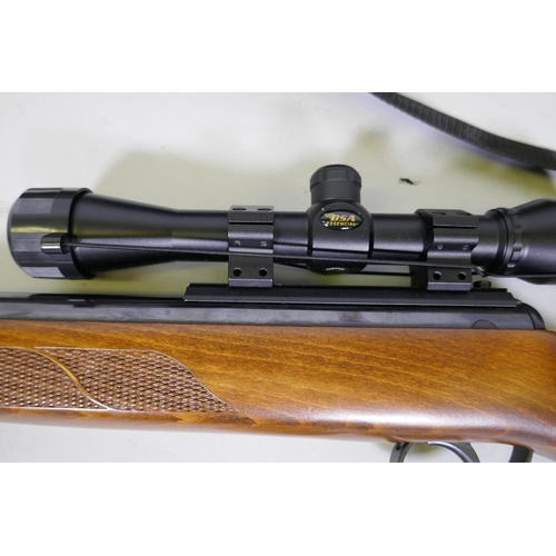 149 - BSA Lightning .22 calibre break barrel air rifle, No S-827859-10, fitted with silencer and BSA Essen... 