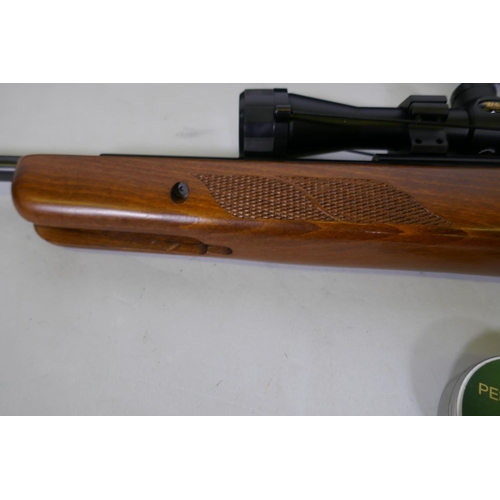 149 - BSA Lightning .22 calibre break barrel air rifle, No S-827859-10, fitted with silencer and BSA Essen... 