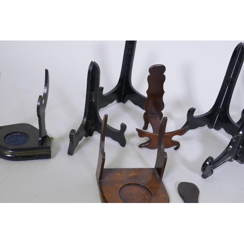 155 - A quantity of Chinese wood stands and a display case, 34 x 29 x 3cm