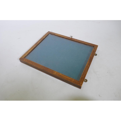 155 - A quantity of Chinese wood stands and a display case, 34 x 29 x 3cm