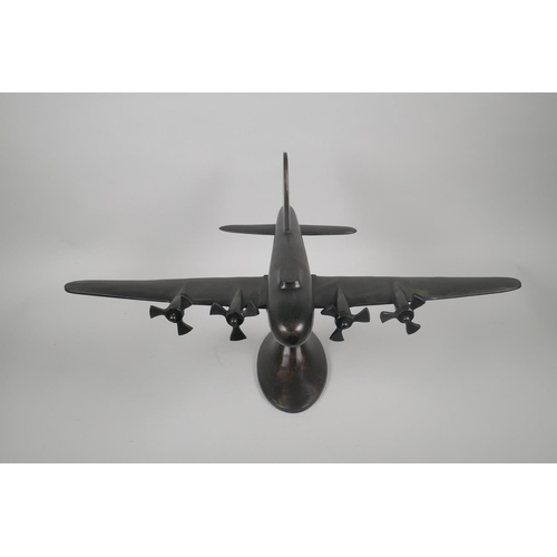 157 - A vintage style bronzed metal desk model of a four engine bomber, wingspan 56cm