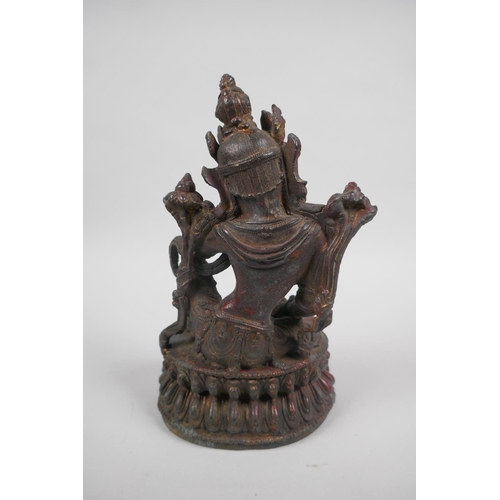 158 - A Tibetan bronzed metal figure of Tara, with the remnants of gilt patina, 19cm high