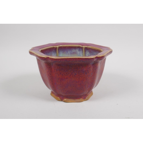 159 - A Chinese Jun ware pottery planter of lobed form with drainage holes to the base, 14cm diameter