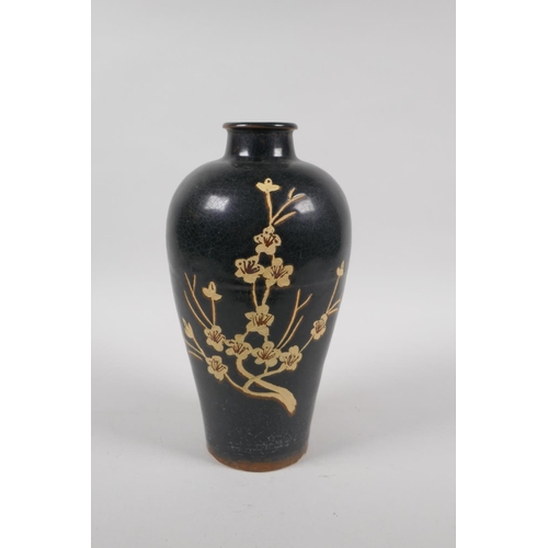 160 - A Chinese Cizhou kiln vase with prunus decoration, 22cm high