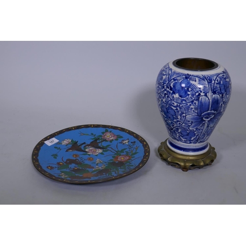 167 - An oriental cloisonne dish, decorated with birds and blossom, 30cm diameter, and a delft pottery oil... 