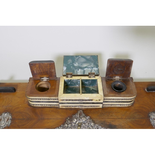 177 - An early C20th walnut desk stand with silver mounts and faux mother of pearl inkwells and stamp box,... 