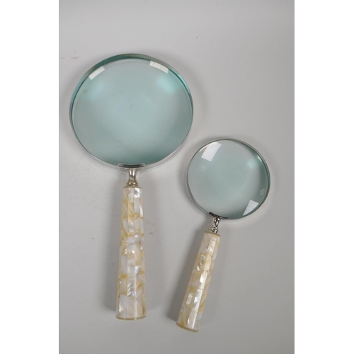 182 - Two mother of pearl handled magnifying glasses, a pair of mother of pearl and brass opera glasses, a... 