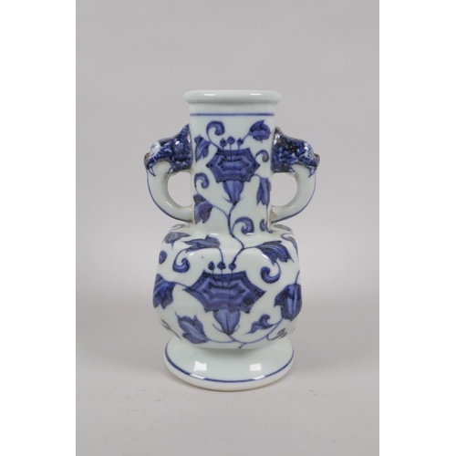 193 - A Chinese blue and white porcelain vase with two dragon mask handles and floral decoration, Xuande 6... 