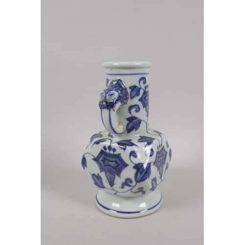 193 - A Chinese blue and white porcelain vase with two dragon mask handles and floral decoration, Xuande 6... 