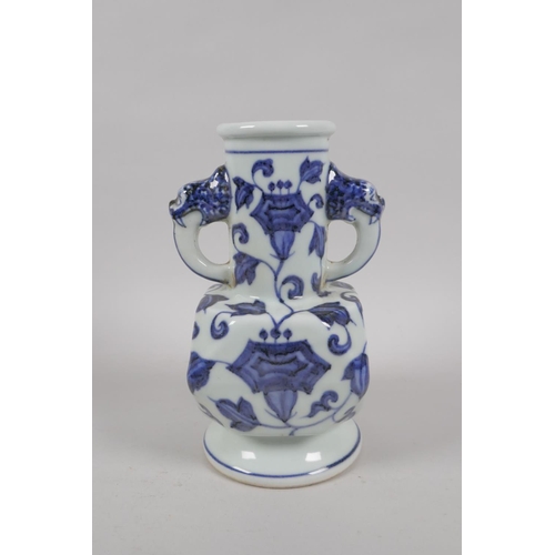 193 - A Chinese blue and white porcelain vase with two dragon mask handles and floral decoration, Xuande 6... 