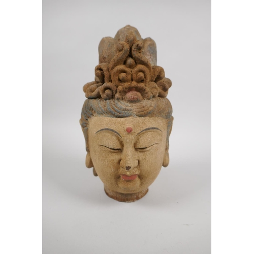 198 - A Chinese carved, painted and distressed wood head bust of Quan Yin, 23cm high