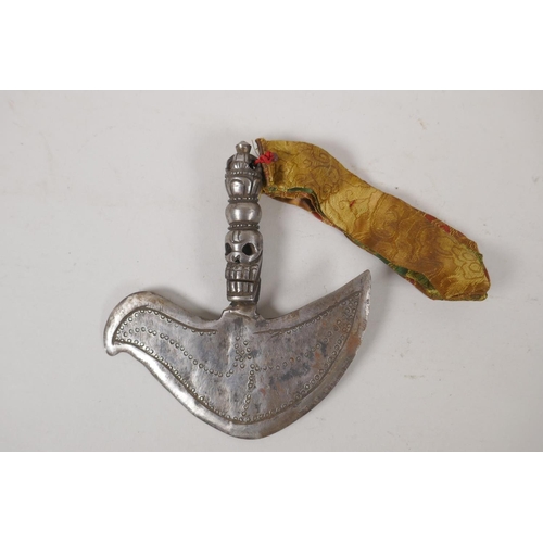 217 - A Tibetan ceremonial metal Kartika with vajra and skull decoration to handle, 17cm