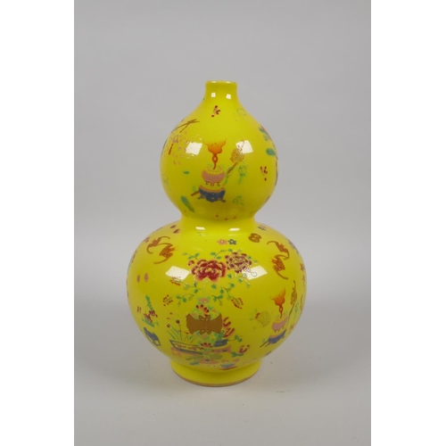 222 - A Chinese yellow ground porcelain double gourd vase decorated with objects of virtue, GuangXu 6 char... 