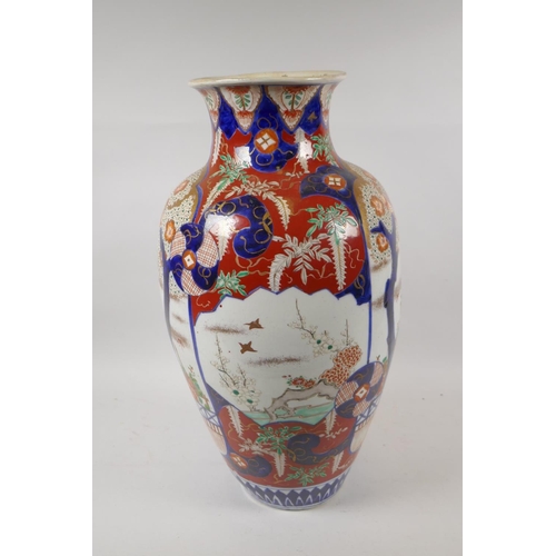 237 - A Japanese Meiji period Imari porcelain vase decorated with birds perched in trees, AF repair to nec... 