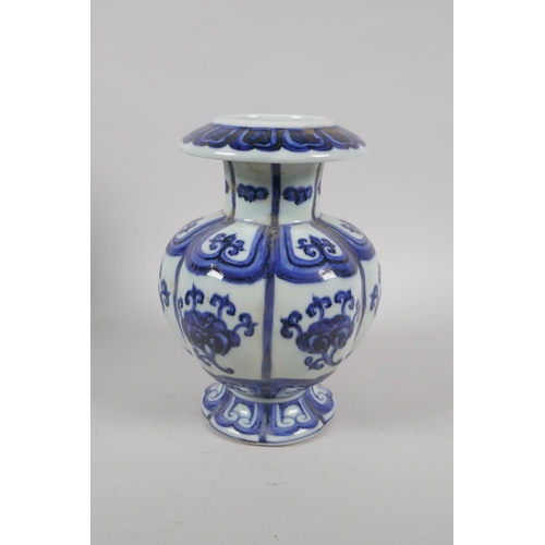 238 - A Chinese blue and white porcelain gourd shaped vase with floral decorative panels, Xuande 6 charact... 