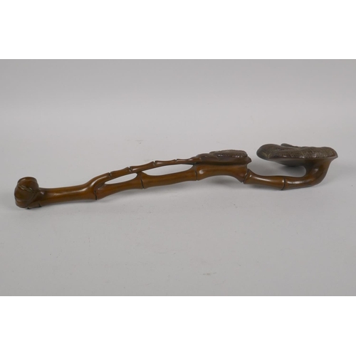 239 - A Chinese carved boxwood ruyi, 35cm long