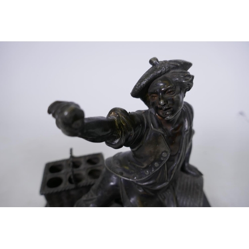 244 - C19th French ebony and spelter smoker's companion, with two spring loaded drawers, one with fitted v... 