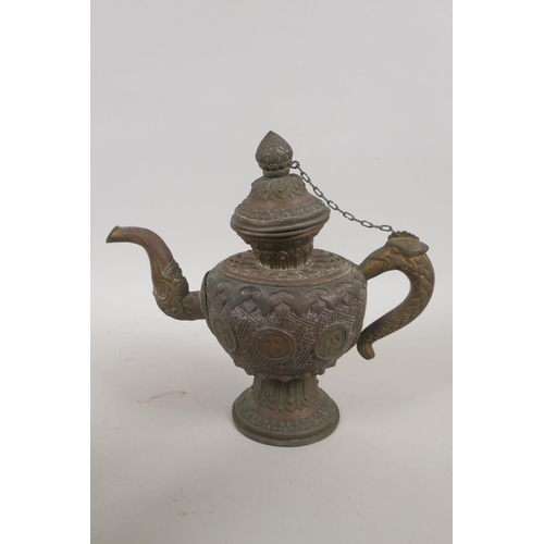 245 - A Tibetan copper and white metal mounted tea pot decorated with dragons and elephants, and another s... 